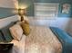 Comfortable bedroom with a plush bed, soft lighting, and a serene ambiance for restful nights at 2601 Gulf N Dr # 221, Bradenton Beach, FL 34217