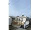 Charming home featuring a wooden deck with awning for relaxing or entertaining outdoors at 2601 Gulf N Dr # 221, Bradenton Beach, FL 34217