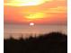 Picturesque sunset view over the ocean, with vibrant sky at 2601 Gulf N Dr # 221, Bradenton Beach, FL 34217
