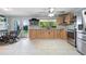 Spacious kitchen with backyard access, stainless steel appliances, and lots of cabinets at 2728 Trinidad St, Sarasota, FL 34231
