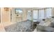 Comfortable living room with a large window, TV and stylish furniture at 2728 Trinidad St, Sarasota, FL 34231