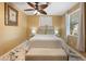 Calm main bedroom with a queen bed, accent lighting, and a ceiling fan at 2728 Trinidad St, Sarasota, FL 34231