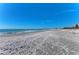 Beautiful beach with clear blue skies and ocean views at 3111 Bayou Sound, Longboat Key, FL 34228