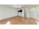 Bright bedroom with wood floors, built-in shelving, and an attached bathroom at 3111 Bayou Sound, Longboat Key, FL 34228