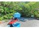 Kayaks ready for a paddle on the water, surrounded by lush greenery at 3111 Bayou Sound, Longboat Key, FL 34228