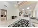 Open-concept living room with high ceilings, bright natural light, and tile floors at 3111 Bayou Sound, Longboat Key, FL 34228