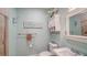A well-organized bathroom featuring a glass shower stall and coordinated decor at 314 Bay S Dr # 5, Bradenton Beach, FL 34217