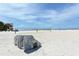 Scenic beach view featuring a climbing elephant structure, volleyball nets and the lifeguard station at 314 Bay S Dr # 5, Bradenton Beach, FL 34217