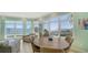 Inviting dining area with waterfront views and comfortable seating, perfect for enjoying meals with a scenic backdrop at 314 Bay S Dr # 5, Bradenton Beach, FL 34217