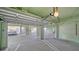 A large garage with multiple parking spaces, ample lighting, and easy access to the building at 314 Bay S Dr # 5, Bradenton Beach, FL 34217