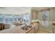 Gourmet kitchen with granite countertops and a view of the living room, dining area and the waterfront at 314 Bay S Dr # 5, Bradenton Beach, FL 34217