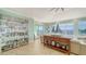 Spacious living room boasting tile flooring, bright lighting, and waterfront views at 314 Bay S Dr # 5, Bradenton Beach, FL 34217