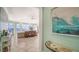 Open concept living room with walls of windows and gorgeous water views at 314 Bay S Dr # 5, Bradenton Beach, FL 34217