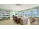Bright living room with tile floors, comfortable seating, water views and ample natural light at 314 Bay S Dr # 5, Bradenton Beach, FL 34217