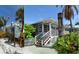 Quaint multi-building restaurant complex with vibrant landscaping, offering a variety of dining options at 314 Bay S Dr # 5, Bradenton Beach, FL 34217
