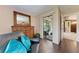 Bedroom with hardwood floors, a sliding glass door to sunroom, and neutral-colored walls at 3549 Wilkinson Woods Dr # 38, Sarasota, FL 34231