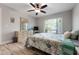 Bedroom featuring a window with natural light and ceiling fan at 3804 Sun Eagle Ln, Bradenton, FL 34210