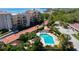 Aerial view of the pool area and landscaping near the bay at 3804 Sun Eagle Ln, Bradenton, FL 34210