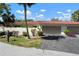 Charming single-story home with a red tile roof, lush landscaping, and an attached two-car garage at 3804 Sun Eagle Ln, Bradenton, FL 34210
