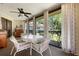 Bright sunroom with large windows providing great outdoor views at 3804 Sun Eagle Ln, Bradenton, FL 34210