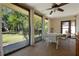 Bright sunroom with views of the exterior yard at 3804 Sun Eagle Ln, Bradenton, FL 34210