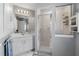 Clean, bright bathroom with a glass-enclosed shower, vanity, and modern fixtures at 3865 N Cranberry Blvd, North Port, FL 34286