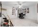 Bedroom with white tile floor, closet and full bathroom at 3865 N Cranberry Blvd, North Port, FL 34286