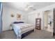 Comfortable bedroom featuring carpet floors, a closet, and a ceiling fan at 3865 N Cranberry Blvd, North Port, FL 34286