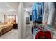 Walk-in closet featuring ample storage space and organization, conveniently located near the bedroom at 3865 N Cranberry Blvd, North Port, FL 34286