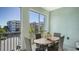 Inviting balcony features seating, offering a serene outdoor space with a view of the complex at 388 Aruba Cir # 201, Bradenton, FL 34209