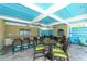 Stylish clubhouse features a dining area, fans, recessed lighting, and great tables for entertainment at 388 Aruba Cir # 201, Bradenton, FL 34209
