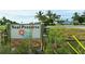 The entrance to the Neal Preserve in Manatee County, Florida, is marked by a welcoming sign amid natural greenery at 388 Aruba Cir # 201, Bradenton, FL 34209