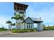 Welcoming community entrance with manicured landscaping and stylish architectural details for a grand sense of arrival at 388 Aruba Cir # 201, Bradenton, FL 34209
