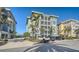 Charming coastal condo building surrounded by lush landscaping and convenient parking for residents and guests at 388 Aruba Cir # 201, Bradenton, FL 34209
