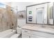 Bright bathroom offers a shower and bathtub combination with neutral color palette at 3926 Sunshine Pine Ave, Bradenton, FL 34203