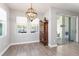 Bright dining area featuring hardwood floors and seamless access to outdoor space at 3926 Sunshine Pine Ave, Bradenton, FL 34203