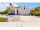 Inviting home featuring a two-car garage and a meticulously maintained front yard at 3926 Sunshine Pine Ave, Bradenton, FL 34203