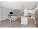 Beautiful kitchen seamlessly connects to the living area, perfect for entertaining and Gathering at 3926 Sunshine Pine Ave, Bradenton, FL 34203