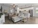 Open-concept living area with hardwood floors and seamlessly connecting to the kitchen at 3926 Sunshine Pine Ave, Bradenton, FL 34203