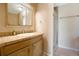 Bright bathroom with a vanity and a tiled shower stall at 401 27Th W St, Bradenton, FL 34205