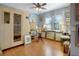 Bedroom featuring wood floors, natural light, and personal sauna at 401 27Th W St, Bradenton, FL 34205