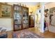 Cozy reading area with vintage bookcases and warm, inviting decor at 401 27Th W St, Bradenton, FL 34205