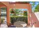 Charming outdoor seating area on the porch, perfect for relaxing with neighborhood views at 401 27Th W St, Bradenton, FL 34205