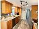 Well-appointed kitchen featuring granite countertops, stainless appliances, and ample wood cabinetry at 41 Young Ave, Englewood, FL 34223