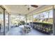 Enjoy this covered patio complete with a ceiling fan and views of lush landscaping at 4201 Center Gate Ln # 1, Sarasota, FL 34233