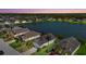 Beautiful aerial view of lakeside homes, showcasing the community's serene setting and access to the water at 5311 72Nd E St, Palmetto, FL 34221