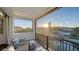 Balcony with views of the water and neighborhood at 551 Ranger Ln, Longboat Key, FL 34228