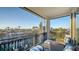 Balcony with seating area overlooking the canal and surrounding neighborhood at 551 Ranger Ln, Longboat Key, FL 34228