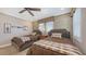 Inviting bedroom with two twin beds, soft lighting, and window views at 551 Ranger Ln, Longboat Key, FL 34228