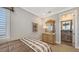 Bedroom featuring a patterned bedspread and decorative furnishings at 551 Ranger Ln, Longboat Key, FL 34228